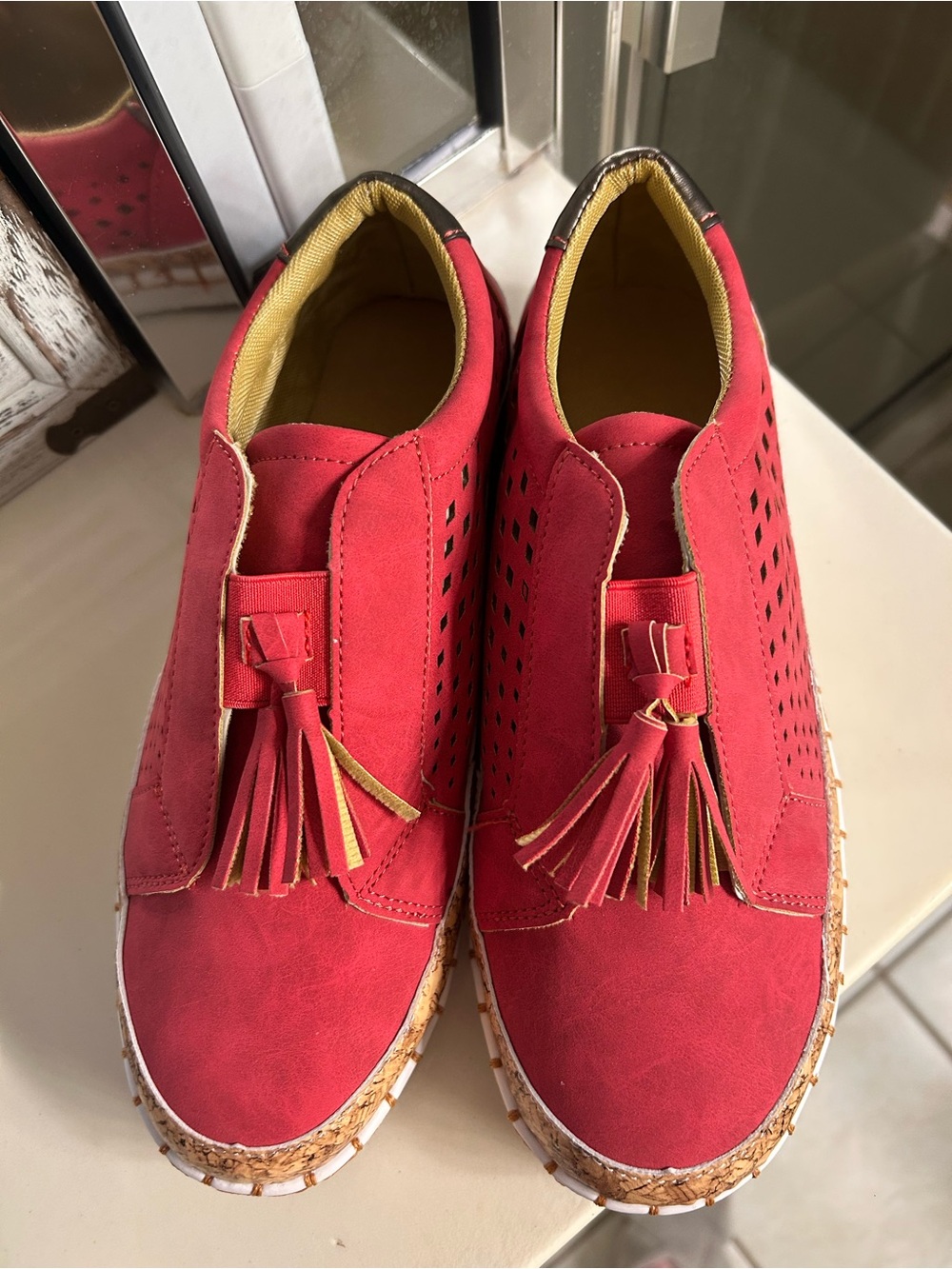 Women’s unbranded red suede finish slip one with cork detail and tassels